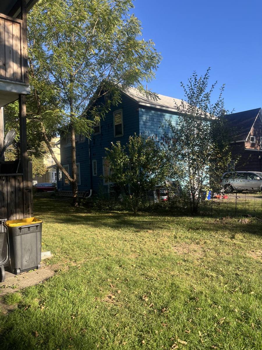Rear view of the two-family from the back yard
