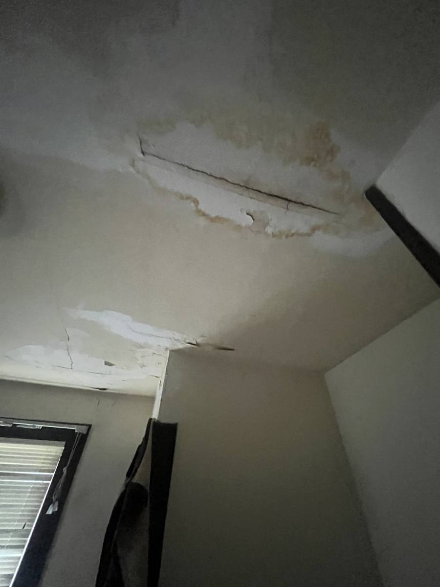 Ceiling with water staining and peeling paint