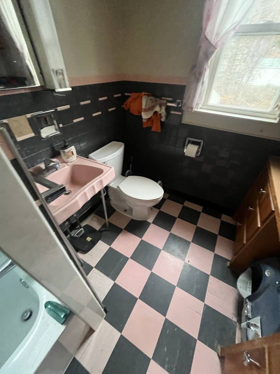 Original pink and black tile bathroom