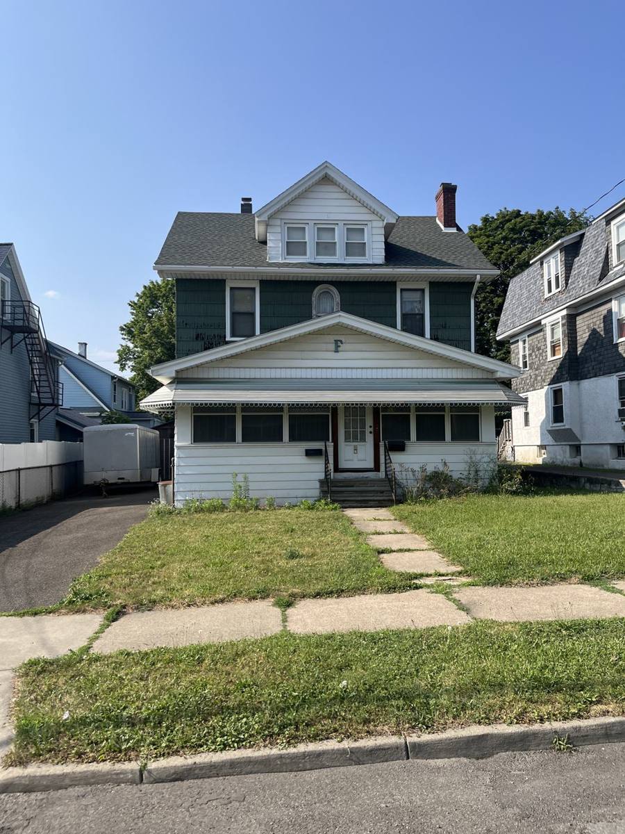 A two-story home on a Binghamton-area street